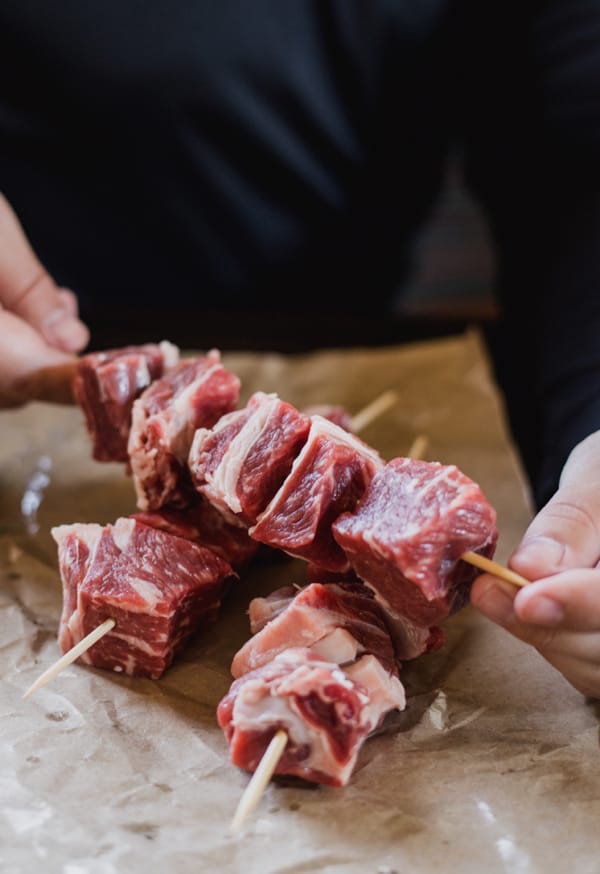 Skewered stew cuts on butcher paper